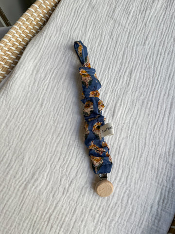 Chupetero flor india mostaza y azul