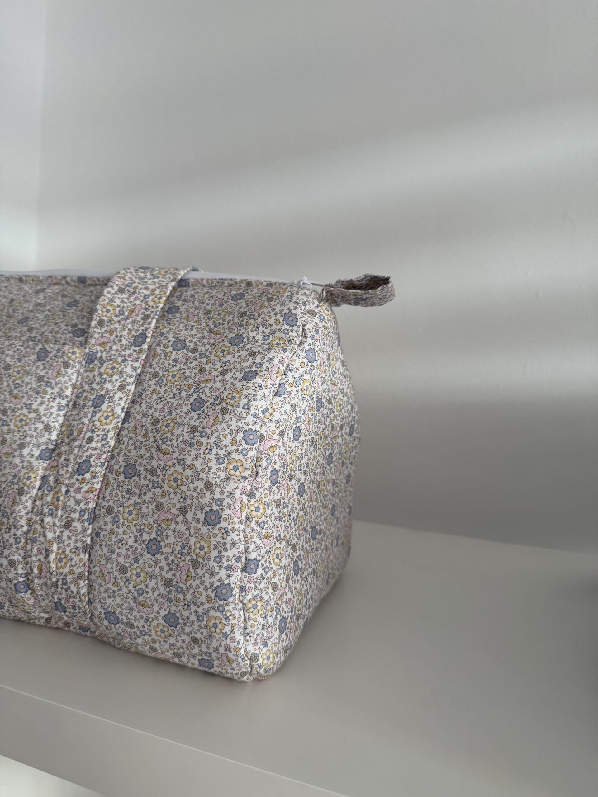 Bolsa de viaje flor gris nude