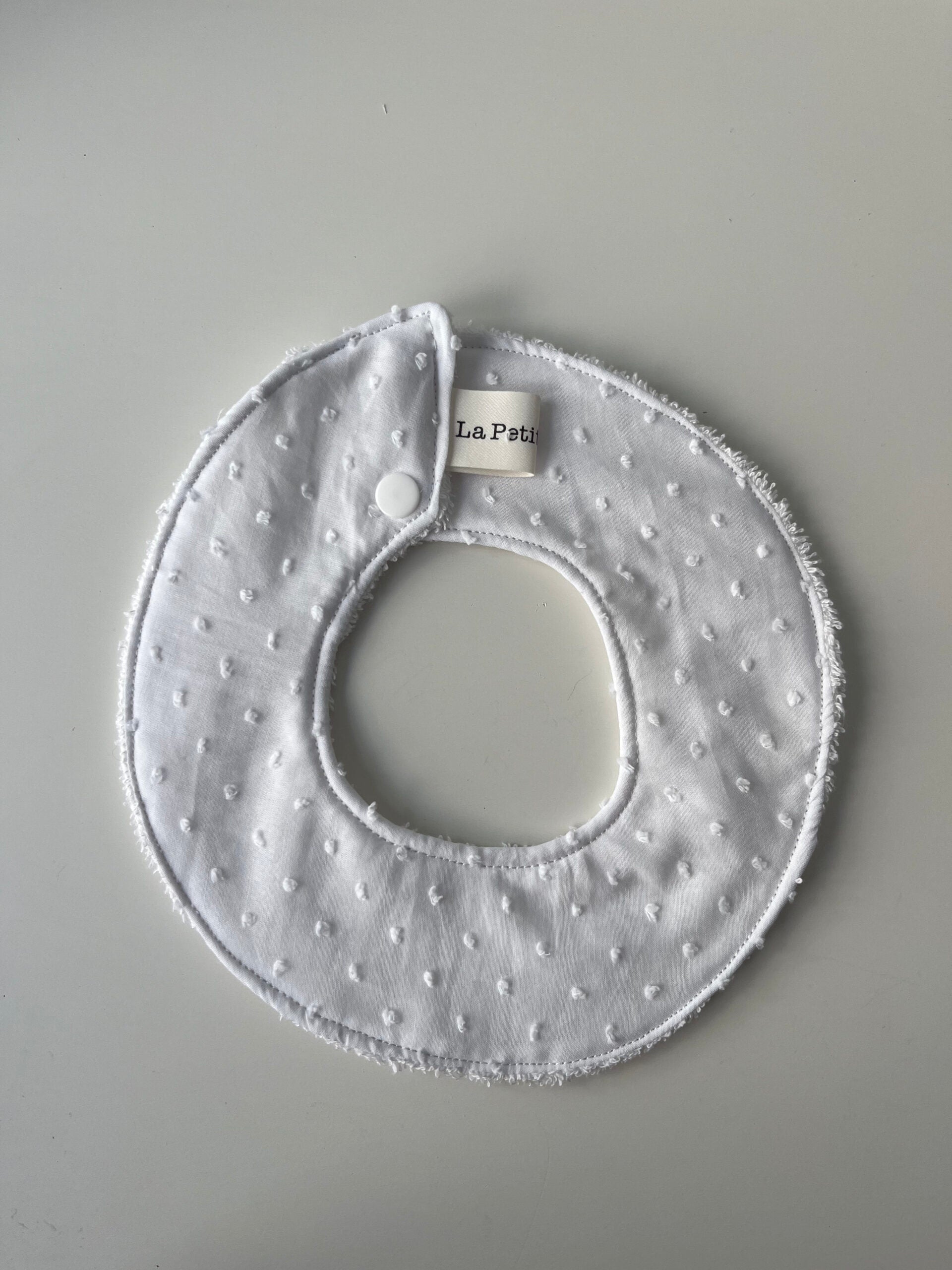 Cuello salvababas plumeti blanco