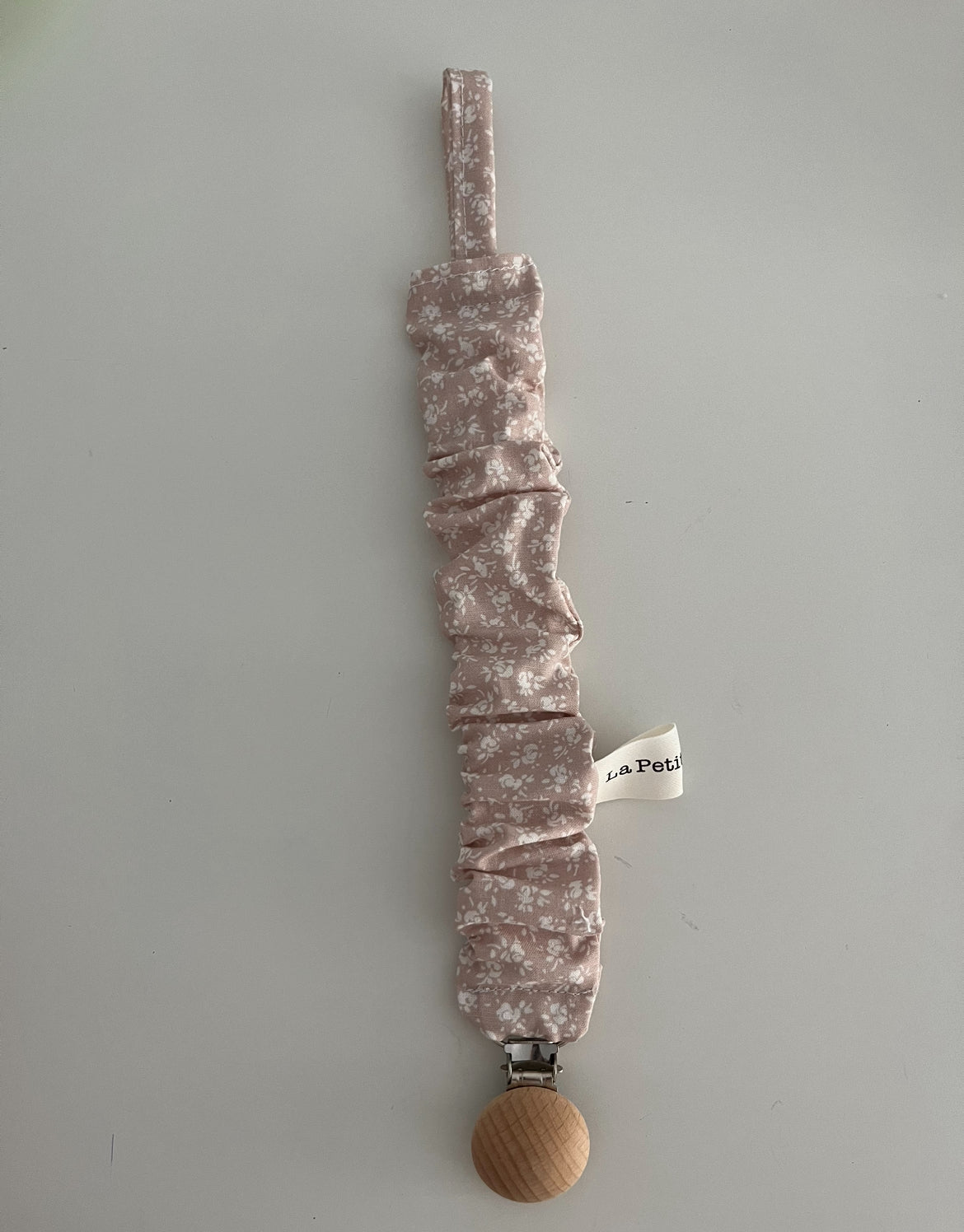 Chupetero hojas rosas