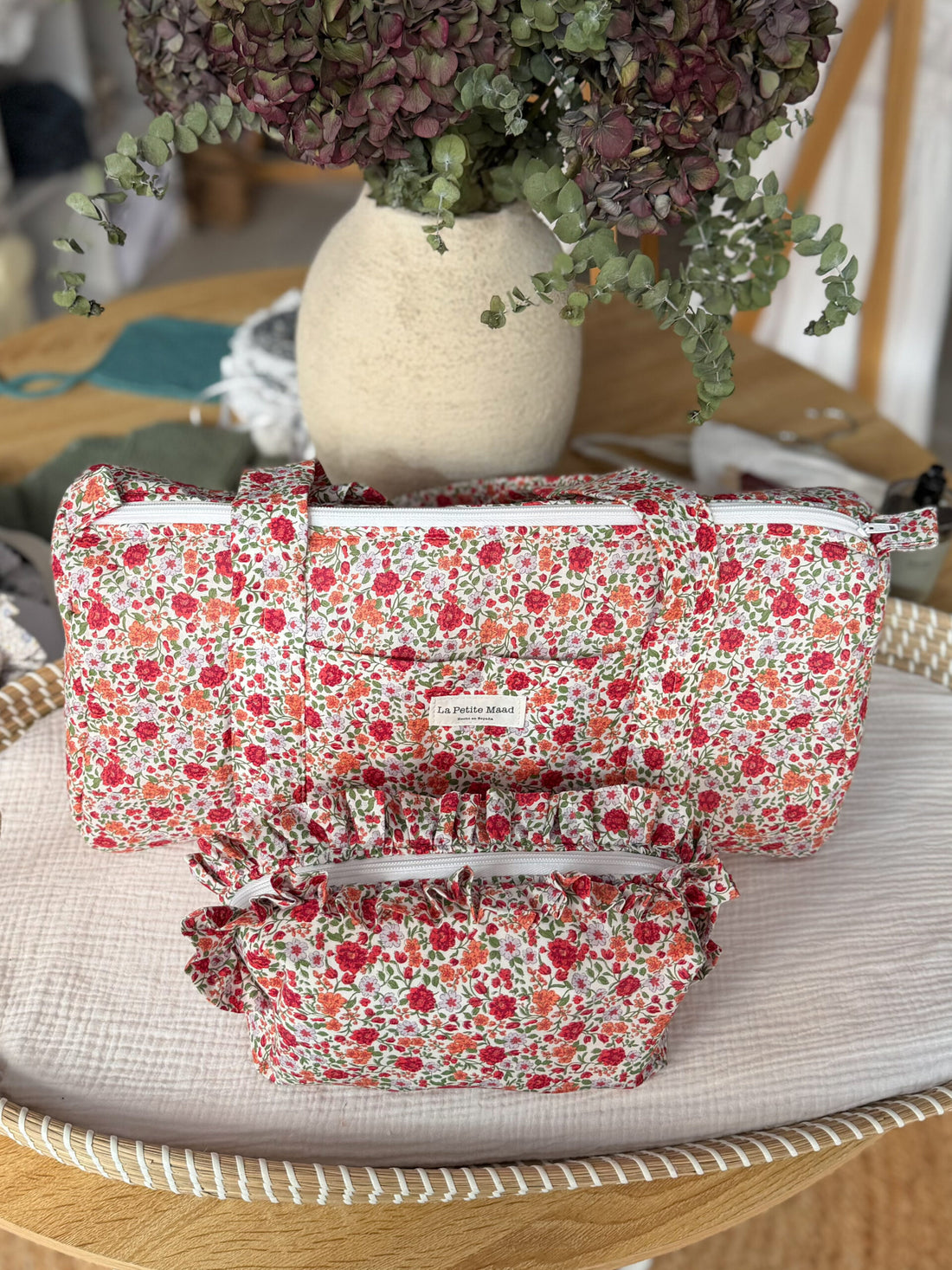 Bolsa de viaje flor roja